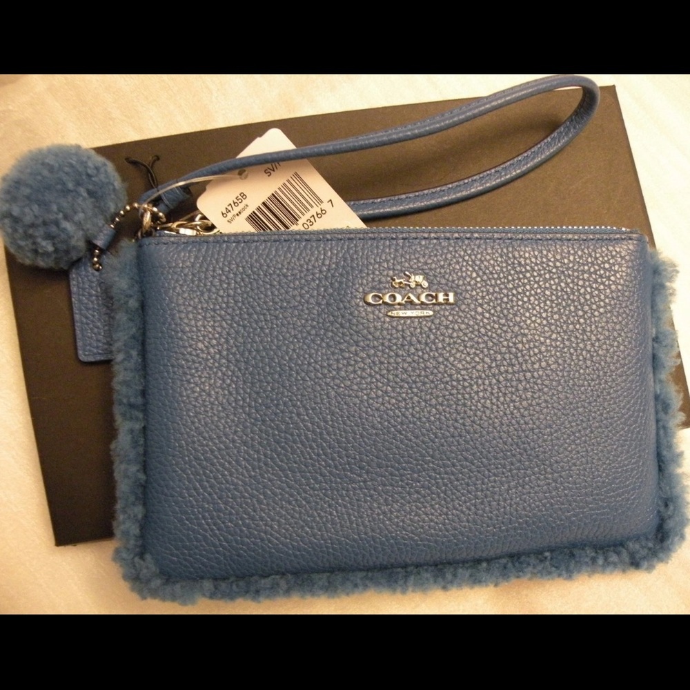 Coach Textured Peacock Blue Wristlet with Pom-Pom and hang tag